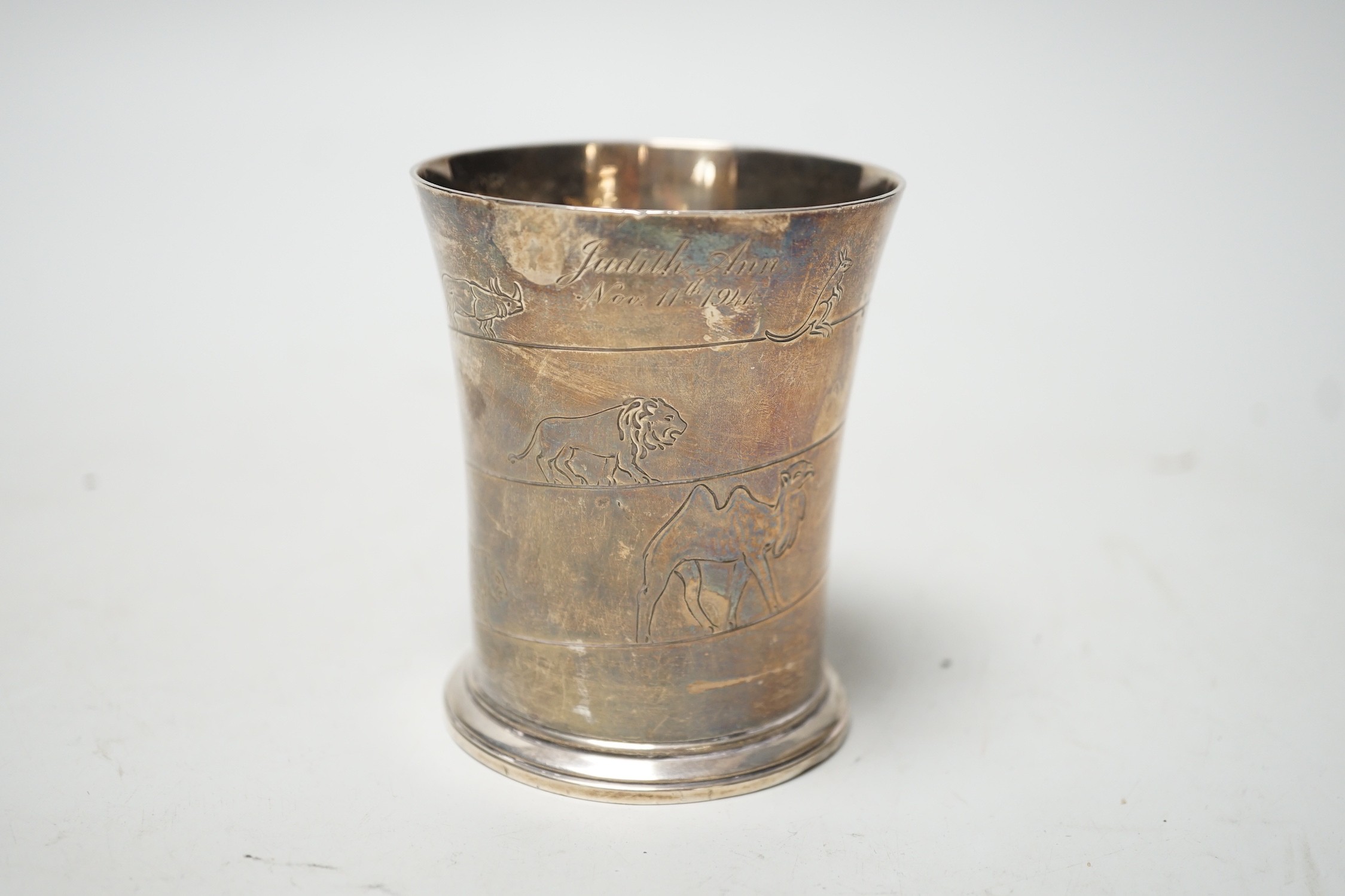 A Harrods silver christening cup decorated with Noah's Ark and animals, Birmingham, 1939, 82mm, 4.5oz.